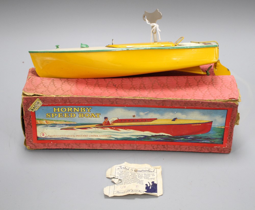 A boxed Hornby tinplate clockwork Swift speedboat no.2, with yellow hull